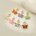 Ciondoli a farfalla in vetro colorato con chiusure dorate, accessori per gioielli fai da te, dettagli. - Arancione