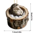 Cute sleeping hedgehog in tree stump hanging ornament, miniature resin animal decor for your home. - Christmas Hedgehog