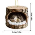 Cute sleeping hedgehog acrylic hanging ornament with winter snow tree stump design for home decor. - Winter Hedgehog