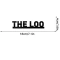 Detail view of black acrylic THE LOO wall sticker sign with dimensions 18x4cm for decor. - JM1167 (The Loo) / Black