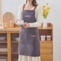 Wasserechte Küchenschürze für Damen, ölbeständige Arbeitskleidung zum Kochen, Haushalt und Catering. - Hosenträger-Stil / Felsgrau