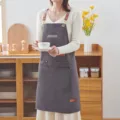 Delantal de cocina gris con correas de cuero y bolsillos, ropa de trabajo impermeable. - De moda / Gris Roca
