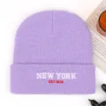 Casual winter knitted beanie in pastel purple with stylish embroidered New York text. - Purple