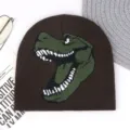 Winter warm knitted beanie hat in brown featuring a cool cartoon dinosaur pattern design. - M (56-58cm) / Coffee