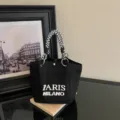 Sac à main seau en tricot noir avec poignée pied-de-poule et texte Paris Milano pour mode. - Noir