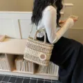Chic straw woven handbag for women, trendy shoulder crossbody tote with cute floral decoration. - Off White