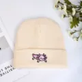 Beige knitted beanie with cute pink axolotl embroidery, warm winter hat for men and women. - Beige