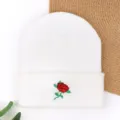 White knitted beanie hat featuring a red rose embroidery design. Warm winter skull cap. - Cooling Cap with Rose Embroidery - White