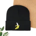 Black knit beanie hat for winter, warm pullover skull cap with cute banana embroidery design. - Banana Embroidered Beanie - Black