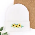 White knitted beanie hat with cute sunflower embroidery, cozy winter warm pullover cap. - Three Daisies Embroidered Beanie - White