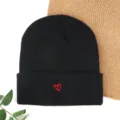 Black winter knit beanie hat with cute red heart embroidery, warm and stylish daily wear. - Red Heart Embroidered Beanie - Black