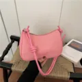 Pink woven underarm shoulder bag, stylish knotted strap design for casual daily fashion wear. - Pink Without Pendant