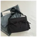 Casual black plaid messenger bag with chic bow accents, versatile crossbody shoulder bag. - Black