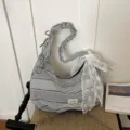 Black and white striped canvas hobo bag with lace bow and scrunchie strap for women. - With Charm / Black