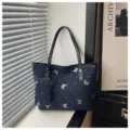 Borsa tote blu navy con farfalle glitterate argentate e comoda pochette coordinata. - Set Due Pezzi (Senza Ciondolo) / Blu