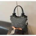 Black and white tweed bucket bag with round leather handles and shoulder strap for women. - No Pendant / Black