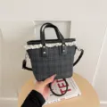 Classic plaid bucket bag with delicate lace trim, versatile shoulder and handbag design. - No Pendant / Black