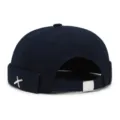 Dark blue brimless docker cap, unisex sailor hat with metal buckle and cross emblem. - Adjustable 55-60 / Navy Blue