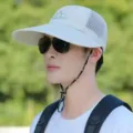 Light grey outdoor sun protection hat with extra-long brim, breathable mesh and wind strap. - Regular Fit / Beige