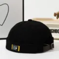 Schwarze Cord Docker Mütze für Damen und Herren, retro brimlose Mütze Streetwear. - Schwarz