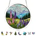 Close-up details of the circular stained glass mountain landscape hanging acrylic decor piece. - PT-TYU040