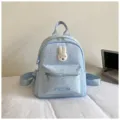 Light blue mini backpack with silver stars, cute rabbit patch, and casual style for daily use. - Blue Without Charm