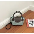 Modische Canvas Knödel Tasche mit Henkeln und praktischer Umhängegurt für den Alltag. - Ohne Anhänger (ZY3170) / Blau und Kaffee