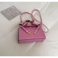 Pink ostrich pattern leather Kelly bag with golden hardware and chic scarf handle. - Pink