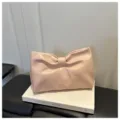 Stylish pink bow clutch bag, minimalist PU leather underarm shoulder bag for women daily commute. - Pink