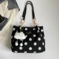 Black polka dot canvas tote bag with gold chain strap and cute cloud plush pendant style. - Black With Pendant
