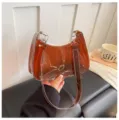 Bolso de hombro hobo translúcido marrón, elegante bolso axilar de PU brillante con cremallera. - Marrón