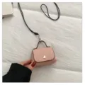 Mini roze lederen handtas schoudertas schattige kleine portemonnee stijlvariant. - Roze