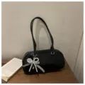 Black vintage oil-wax leather shoulder underarm baguette bag with pearl bow pendant. - Black With Pendant
