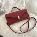 Elegant women's crossbody bag with woven texture, chic top handle daily commuter purse. - Red