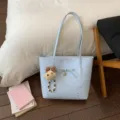 Light blue star embossed tote bag featuring cute bear pendant and bow, stylish daily shoulder bag. - With Pendant / Blue