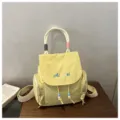 Chic canvas backpack for women casual lightweight school bookbag daily commuter bag stylish - Yellow