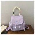 Casual fashion women backpack, trendy purple commuter school bag with cute beaded charm. - Purple