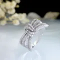 Prachtige zilverkleurige strik ring met kubieke zirkonia, trendy dames sieraad in luxe stijl. - Maat 6 / Zilver
