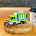 Alloy food truck keychain with sushi theme, creative decompression toy pendant for gifts. - Sushi Food Truck Keychain