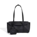Schwarze Ledertasche für Damen, schicke Baguette-Tasche mit minimalistischem Design, geräumig. - 34*12*17CM / Schwarz