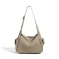 Sac à main bandoulière en cuir véritable, design taupe élégant avec poches latérales. - Gris Tourterelle