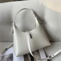 Sac à épaule minimaliste en cuir blanc pour femme, élégant sac hobo avec fermeture métallique. - Blanc Cassé