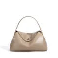 Elegant genuine leather shoulder handbag with slouchy design and turn-lock closure. - Milk Tea Apricot