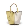 Borsa a secchiello bicolore in vera pelle, elegante borsa da design con chiusura a lucchetto donna. - 18 cm giallo pulcino e bianco crema (fibbia argento)