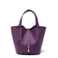 Elegante borsa a secchiello in vera pelle viola con manico e chiusura a lucchetto. - 18 cm viola anemone (fibbia oro)