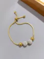 Bracciale in acciaio inossidabile dorato con perle di cristallo scintillanti regolabile. - Doppia Sfera di Zirconia Dorata