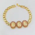 Vergoldetes Herzglied-Armband mit drei Marien-Medaillons und roten Zirkonia-Steinen. - Roter Zirkonia