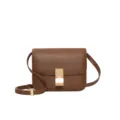 Classic brown leather shoulder bag with gold metal clasp, elegant vintage crossbody design. - Small 20cm / Caramel color
