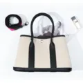 Canvas and leather tote bag with top handles, chic commuter handbag for women variant. - 30cm / Black