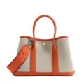 Orange canvas and leather tote bag, stylish commuting handbag with wide shoulder strap. - 36cm / Orange